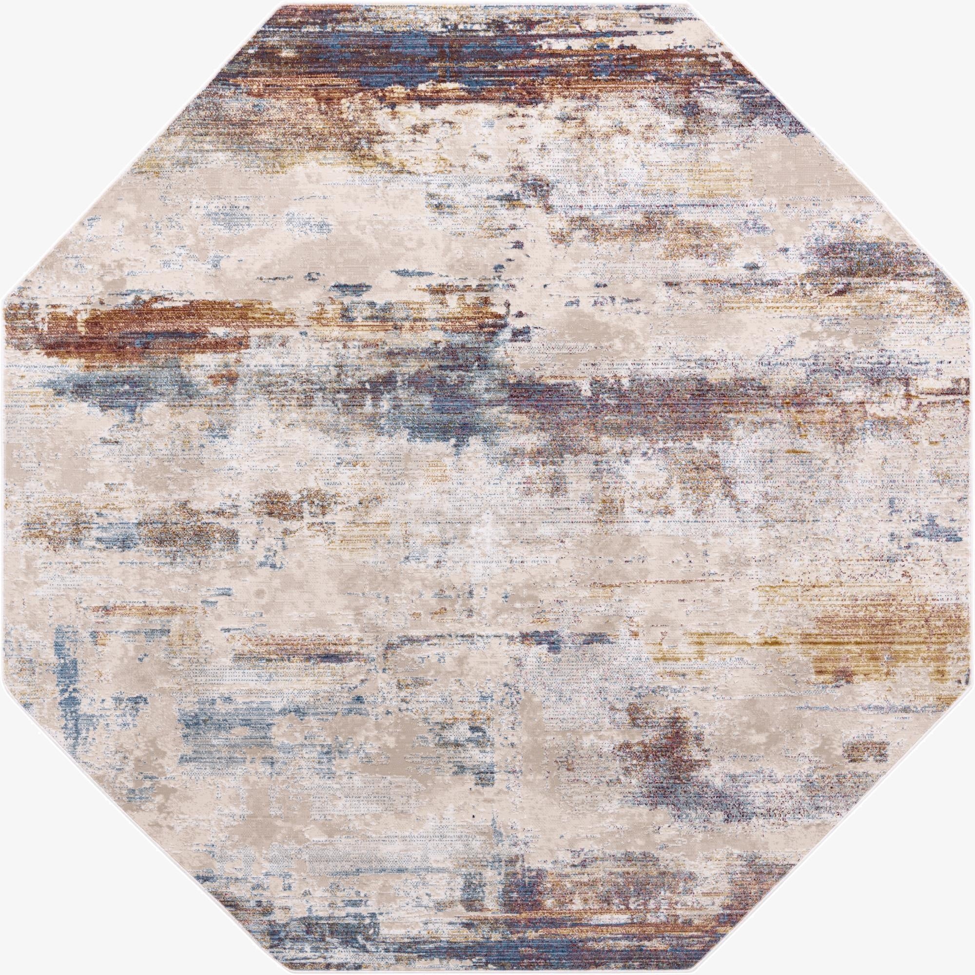 Octagon-shaped Deepa rug with a multi-colored abstract pattern featuring distressed blues, browns, and creams.