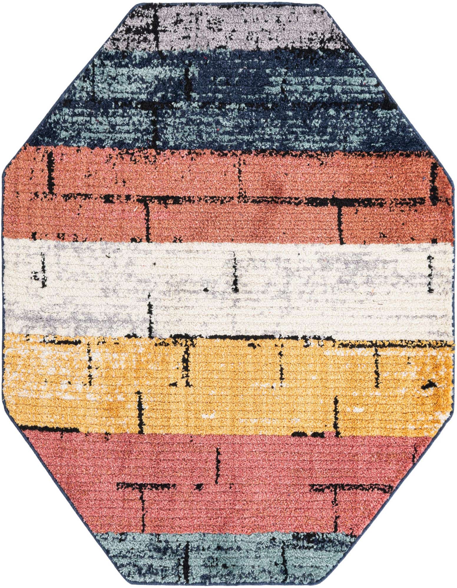 A multi-colored octagon rug with a modern striped pattern, featuring shades of blue, coral, white, and gold.