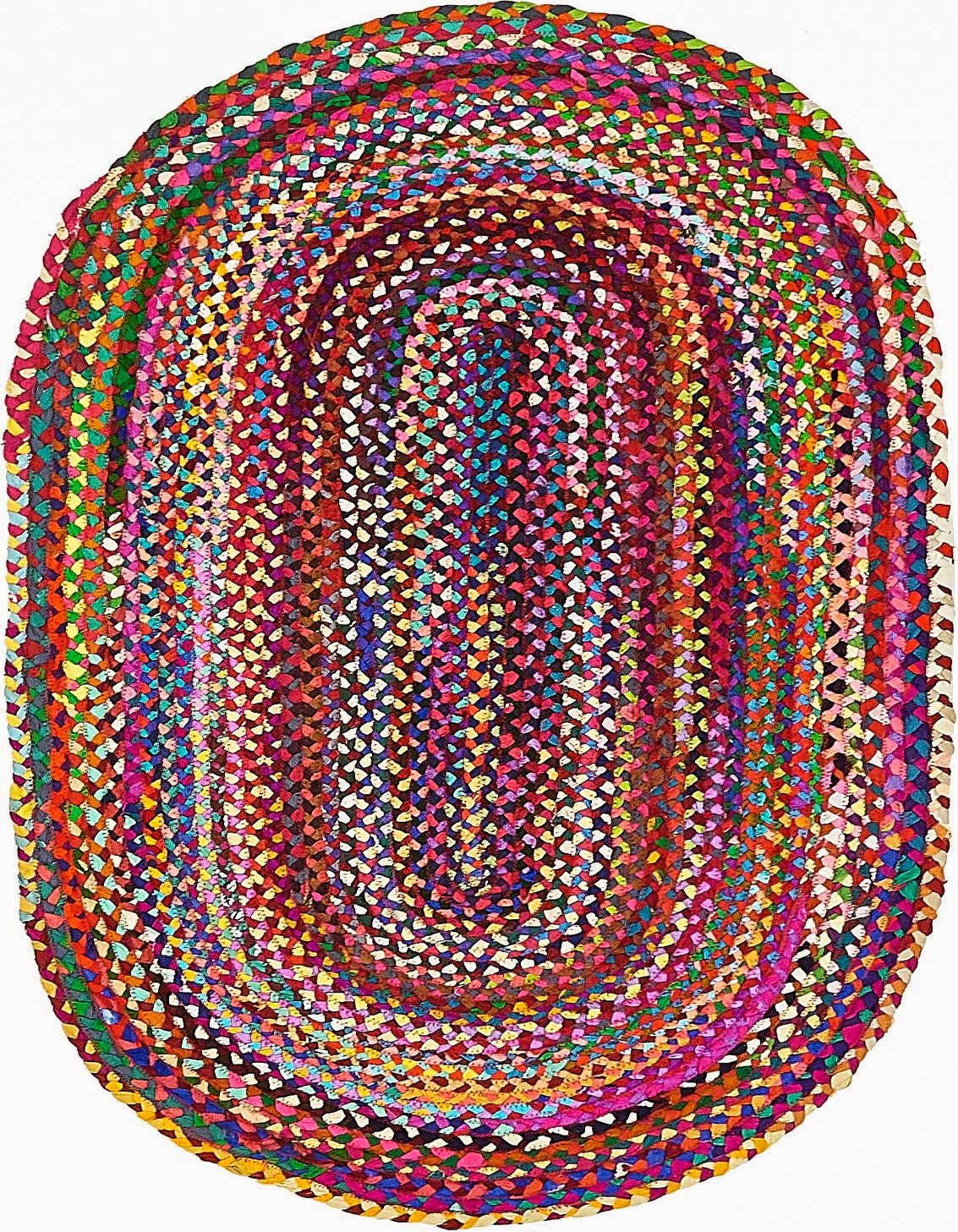 A vibrant 3' 3 x 5' 1 oval braided chindi rug in a multi-colored pattern, made from recycled cotton.