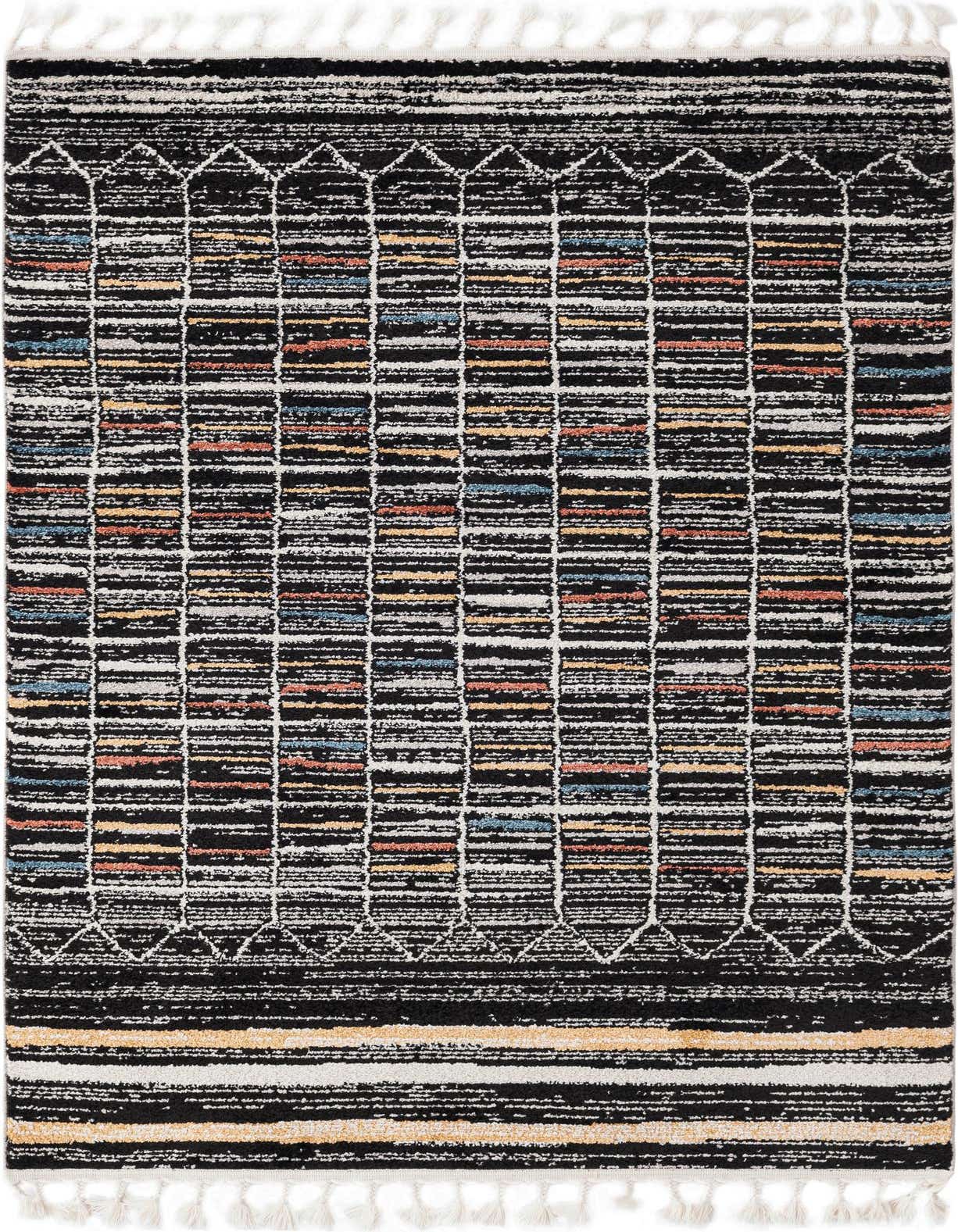 A 4x6 rectangular Aramis rug featuring a multi-colored stripe pattern with black, white, orange, and blue hues, and decorative white tassels.