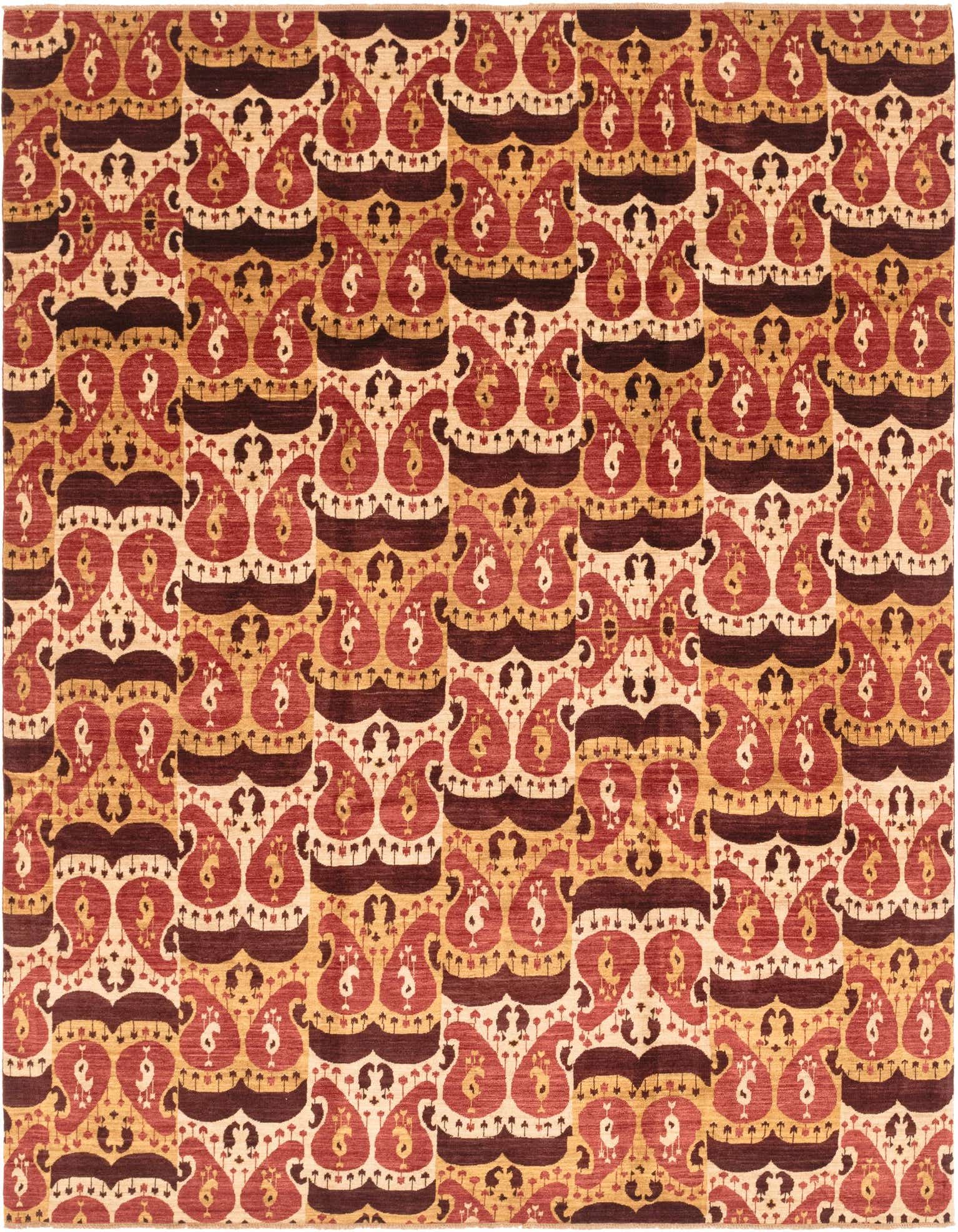 A rectangular 8x10 Ariana Ziegler rug featuring a multi-colored tribal paisley pattern in shades of red, gold, and cream.