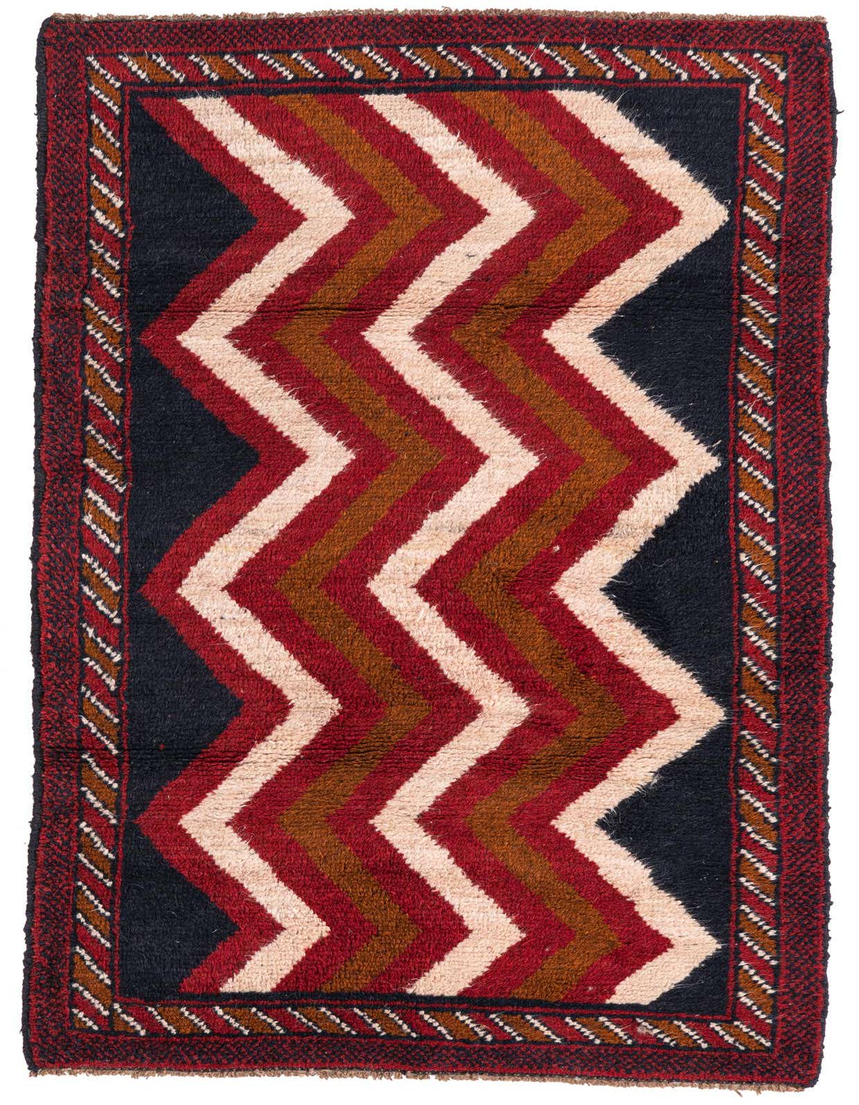 A 3x5 rectangular Balouch wool rug featuring a bold multi-colored zigzag pattern with red, brown, and cream stripes on a dark background, framed by a detailed border.