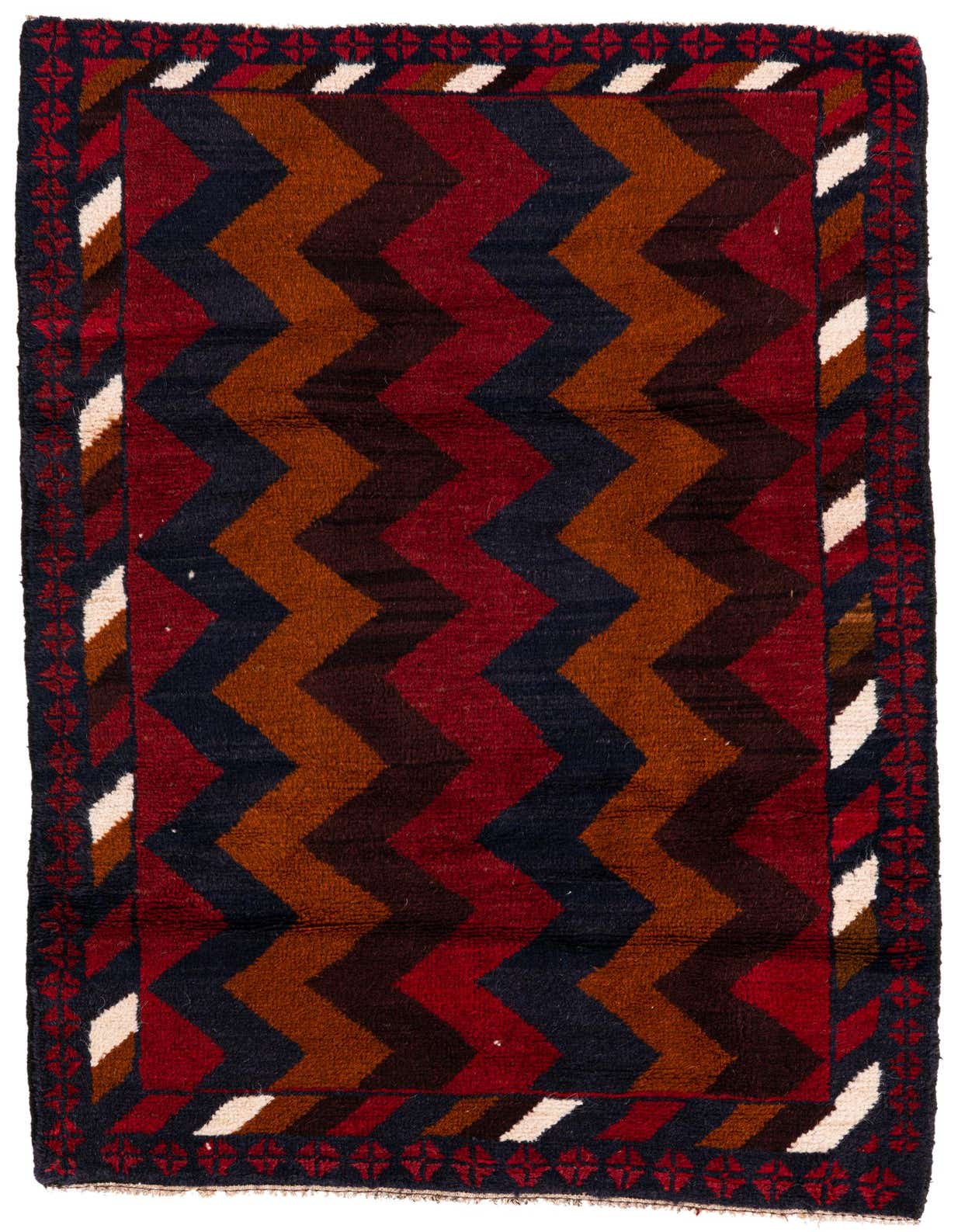A 3x5 rectangular Balouch rug featuring a bold multi-colored zigzag pattern in red, navy, and brown, with a tribal border.