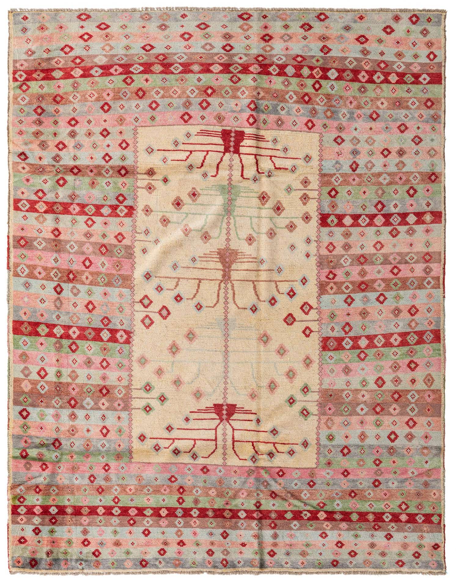 A 6x9 rectangular multi-colored tribal wool rug with a light center panel and striped borders, featuring abstract motifs.