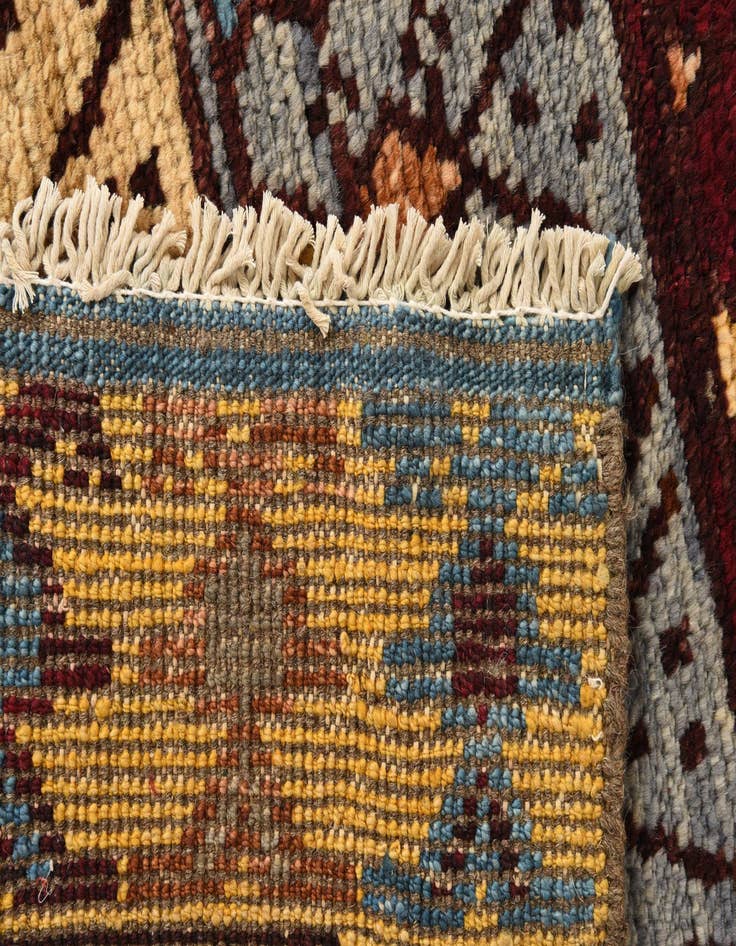 Detail image of  4' 2 x 6' 3  Hand Knotted Balouch Wool Rug
