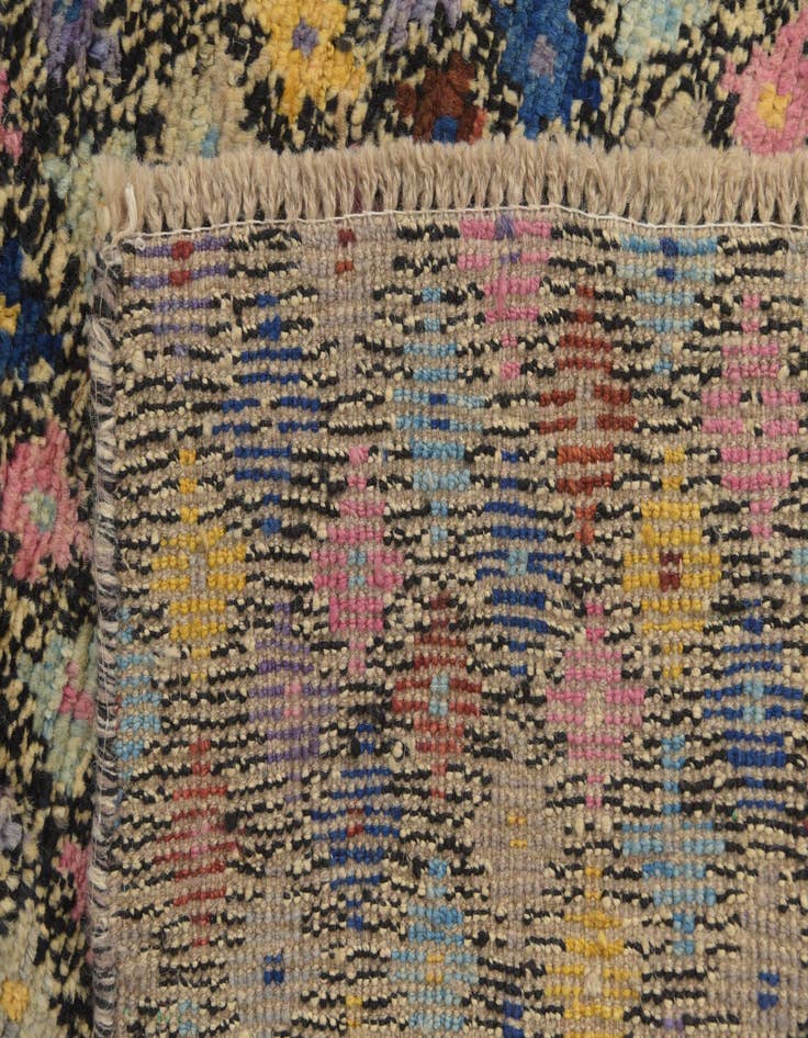 Detail image of  4' 1 x 5' 9  Hand Knotted Balouch Wool Rug