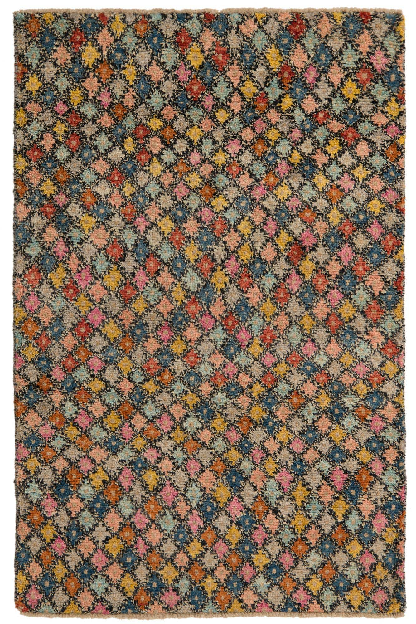 A 4x6 rectangular Balouch rug with a multi-colored tribal pattern, featuring small diamond shapes in various bright colors on a dark background.