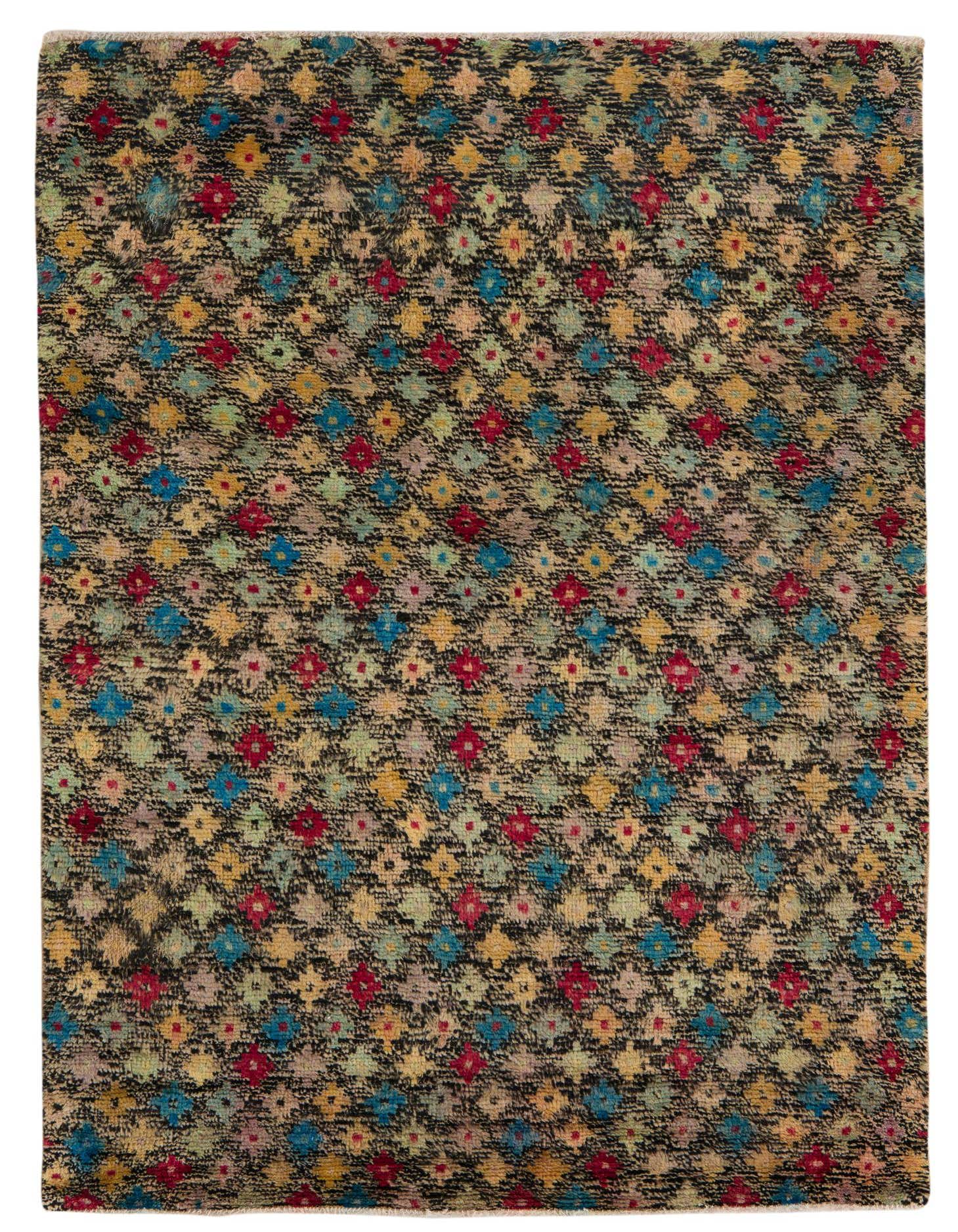 A 4x6 rectangular Balouch rug with a multi-colored tribal pattern on a dark background, showcasing its thin pile.