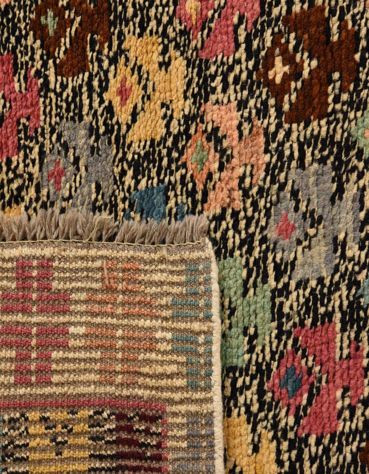 Detail image of  4' 3 x 6' 4  Hand Knotted Balouch Wool Rug