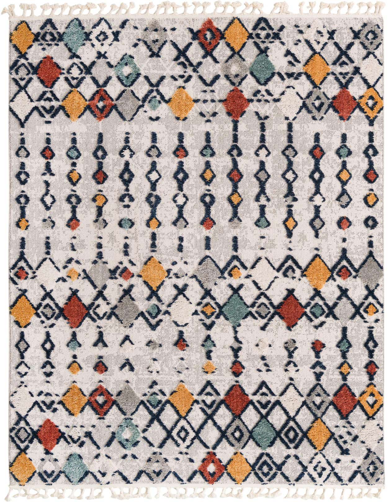 A 6x9 rectangular multi-colored tribal rug featuring a modern abstract diamond and stripe pattern on a light background, with short tassels.