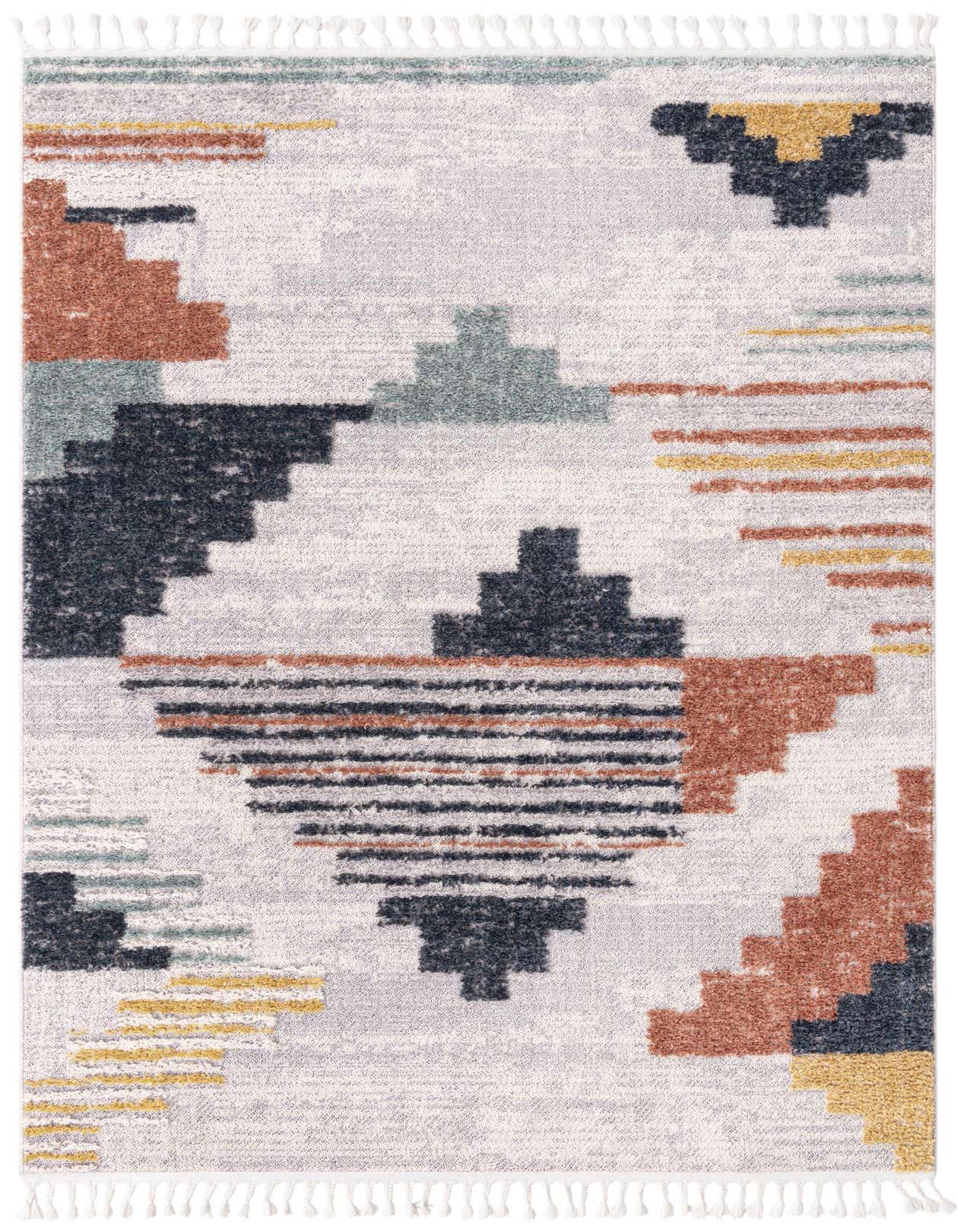A 6x9 rectangular multi-colored tribal rug with a modern abstract pattern featuring geometric shapes in rust, teal, navy, and yellow on a light background, with white tassels.