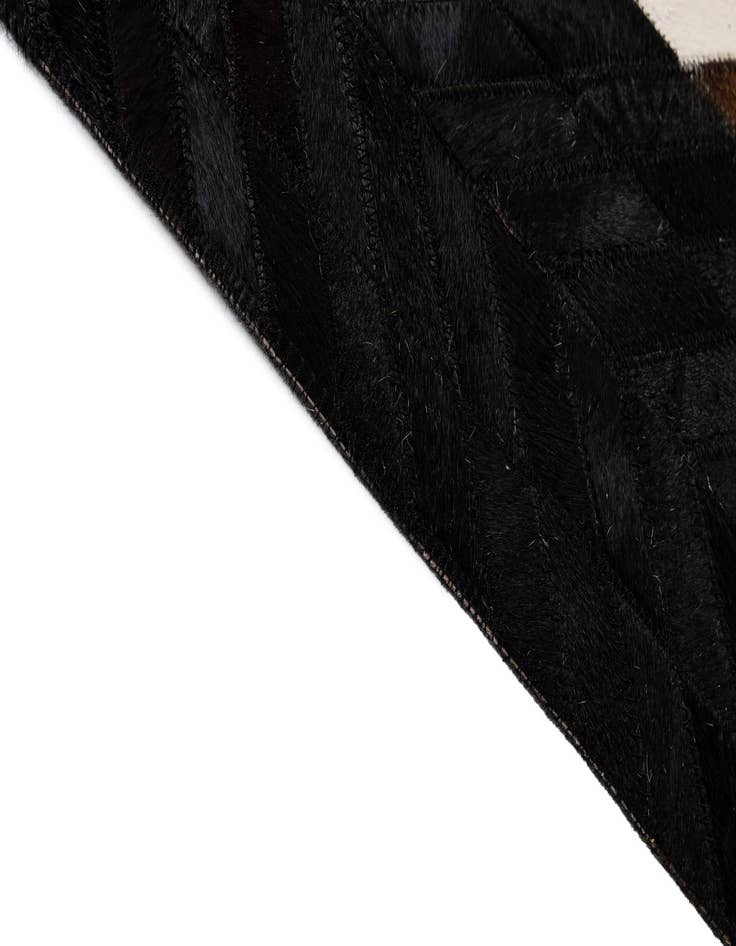 Detail image of  7' 11 x 9' 11 Cowhide - Patchwork Rug