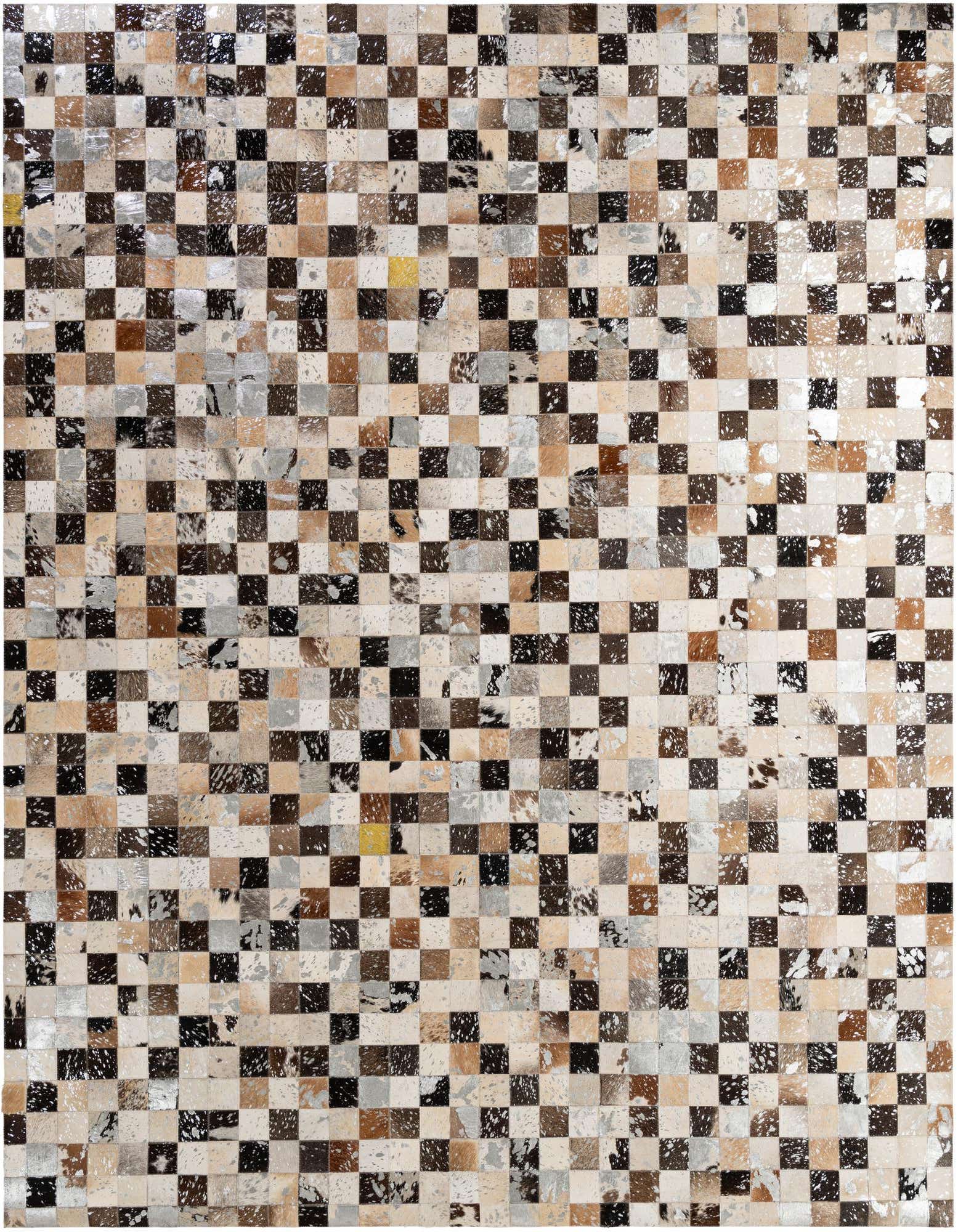 A rectangular 8x10 multi-colored modern patchwork cowhide rug, featuring a checkerboard pattern of natural hide squares in shades of brown, black, white, and beige.