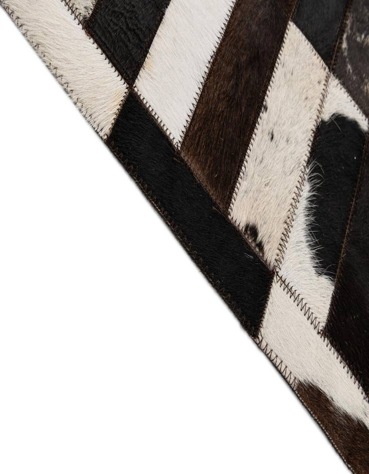 Detail image of  8' 2 x 9' 10 Cowhide - Patchwork Rug