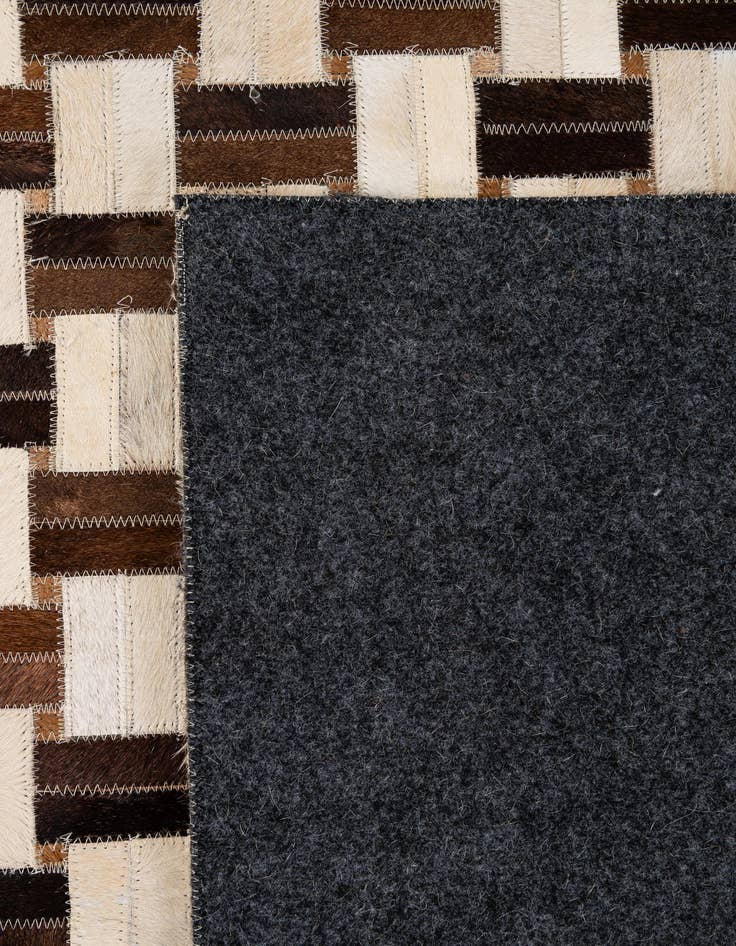 Detail image of  7' 8 x 9' 11 Cowhide - Patchwork Rug