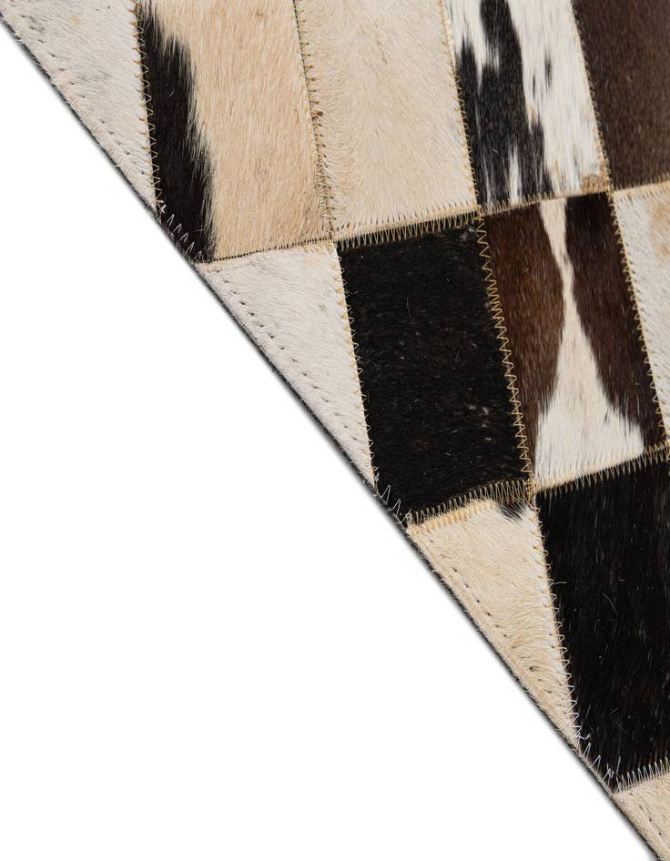 Detail image of  8' 1 x 9' 11 Cowhide - Patchwork Rug