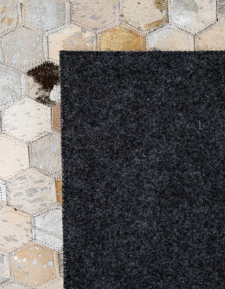 Detail image of  5' 2 x 8' 1 Cowhide - Patchwork Rug