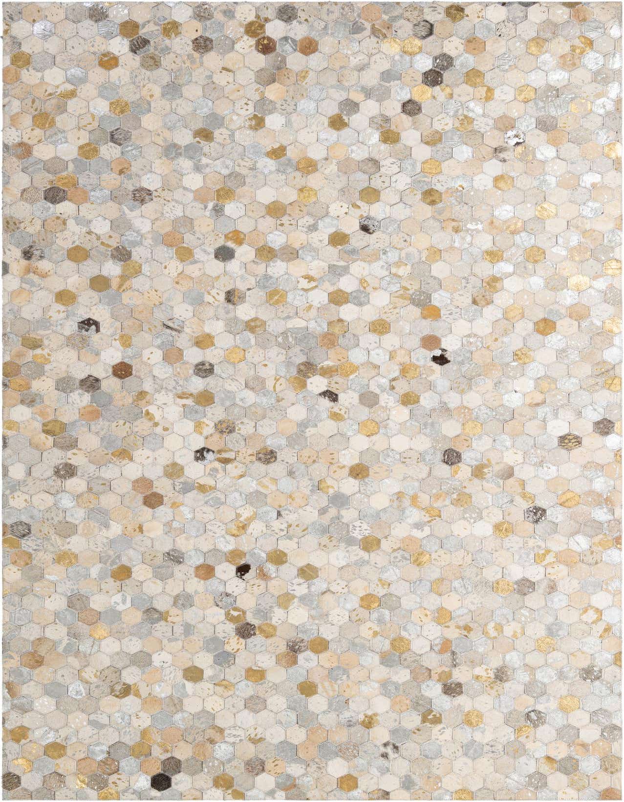 A rectangular 5x8 modern patchwork cowhide rug featuring a mosaic of multi-colored hexagonal pieces in shades of gold, silver, beige, and brown.