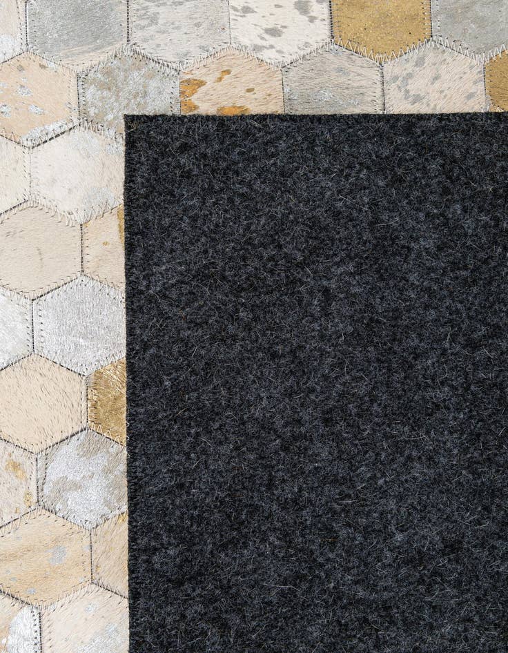 Detail image of  5' 2 x 8' Cowhide - Patchwork Rug