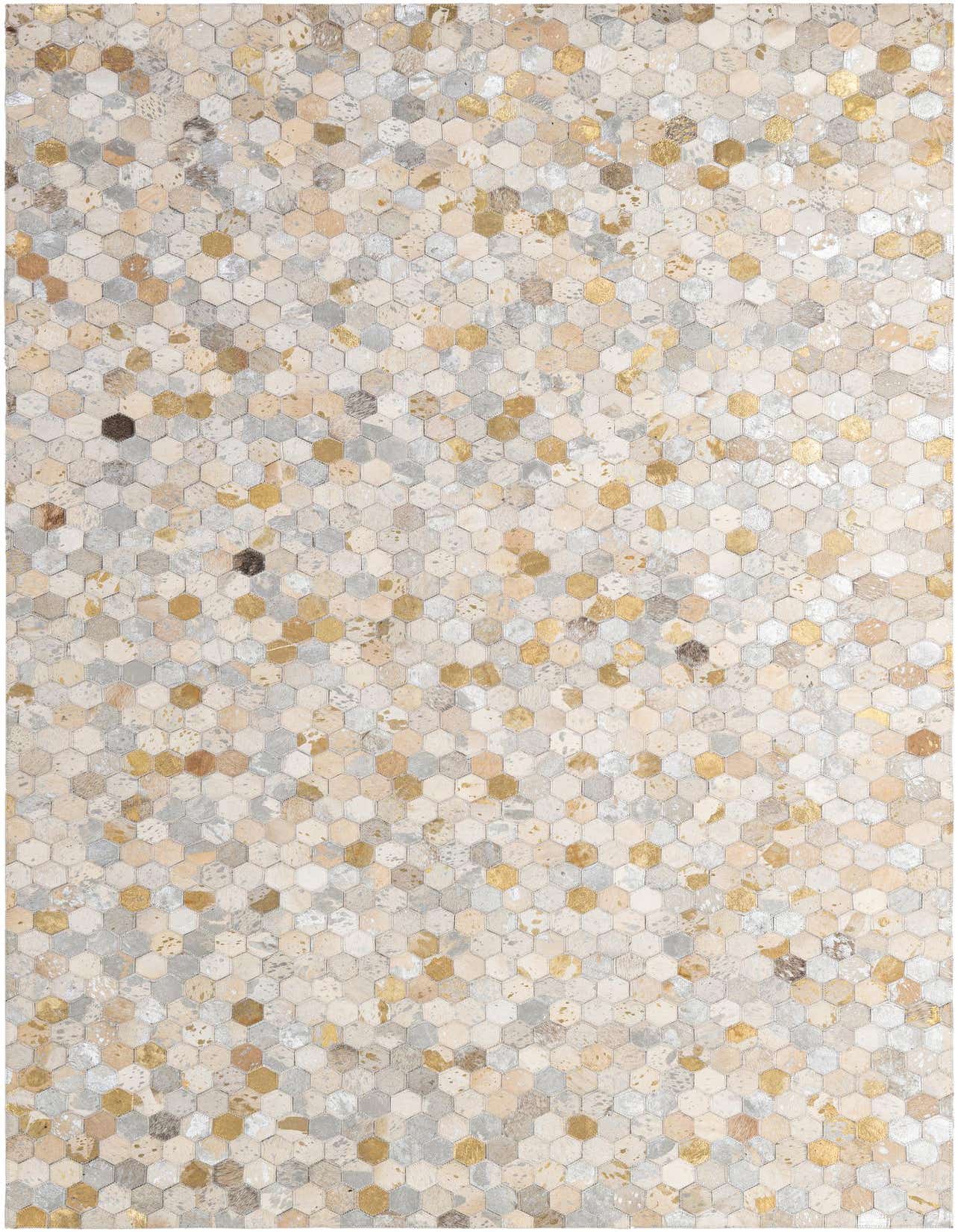A 5x8 rectangular Cowhide Patchwork rug with a modern hexagonal pattern in multi-colored natural and metallic gold tones.