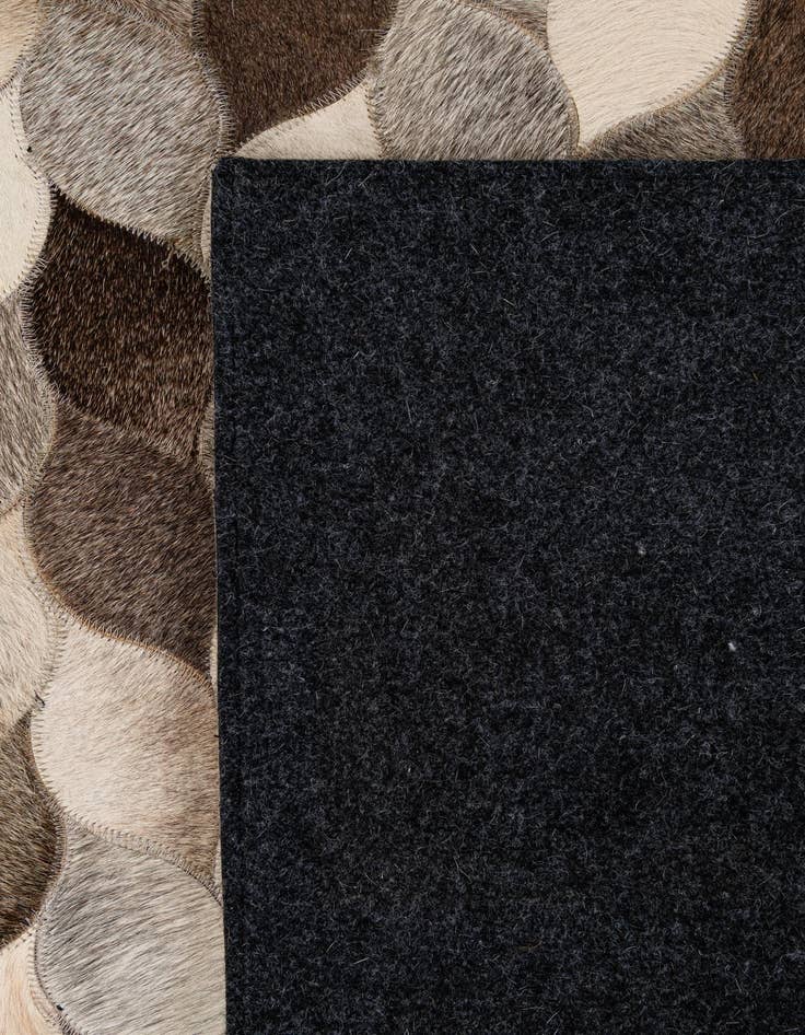 Detail image of  5' 1 x 8' 1 Cowhide - Patchwork Rug