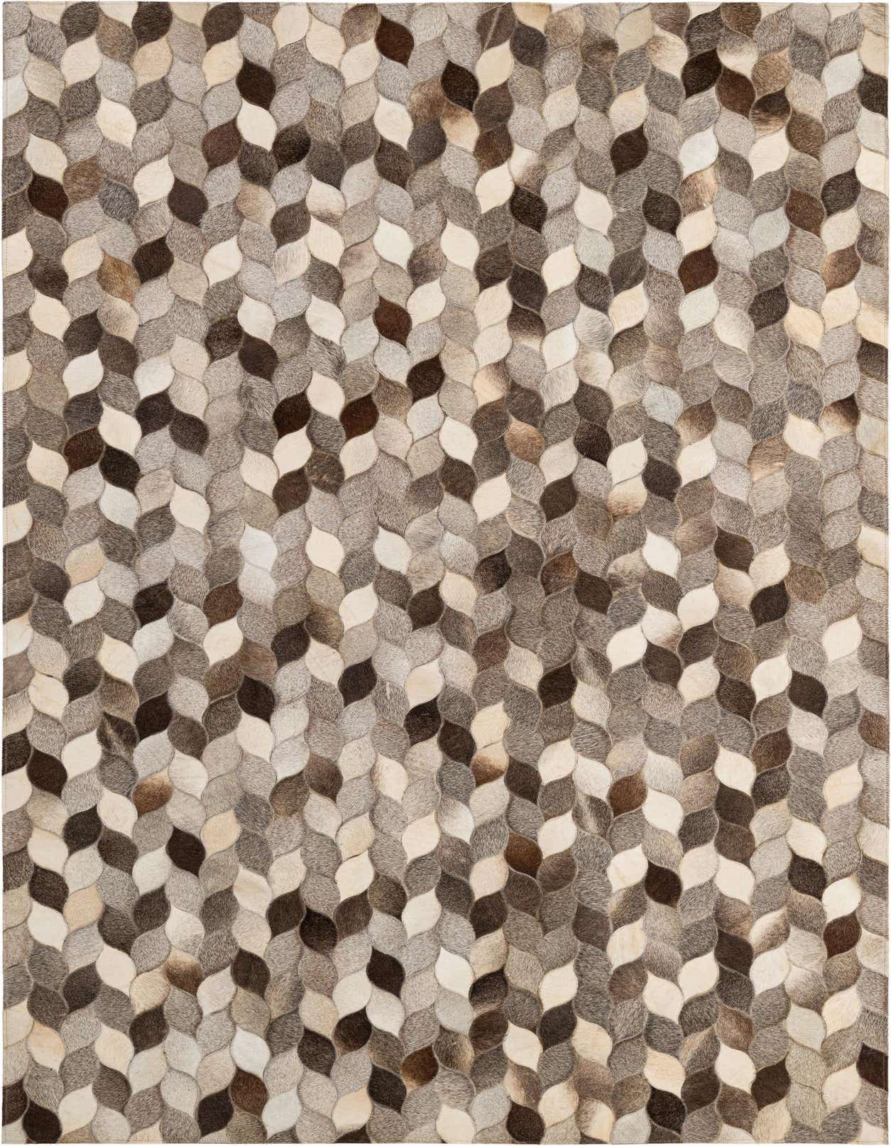 A 5x8 rectangular Cowhide Patchwork rug featuring a modern leaf-like pattern in various shades of brown, grey, and cream.