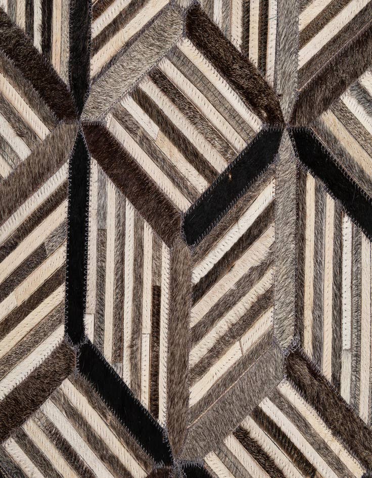 Detail image of  4' 11 x 7' 10 Cowhide - Patchwork Rug