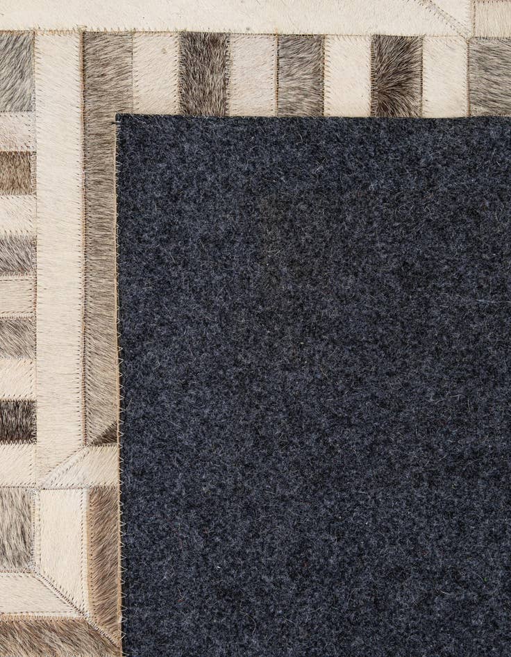 Detail image of  5' 2 x 8' Cowhide - Patchwork Rug