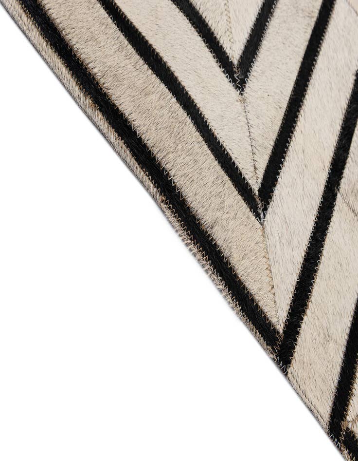 Detail image of  5' 5 x 7' 6 Cowhide - Patchwork Rug