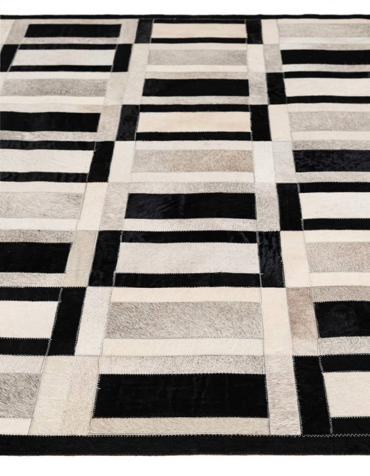 Detail image of  5' 1 x 7' 11 Cowhide - Patchwork Rug