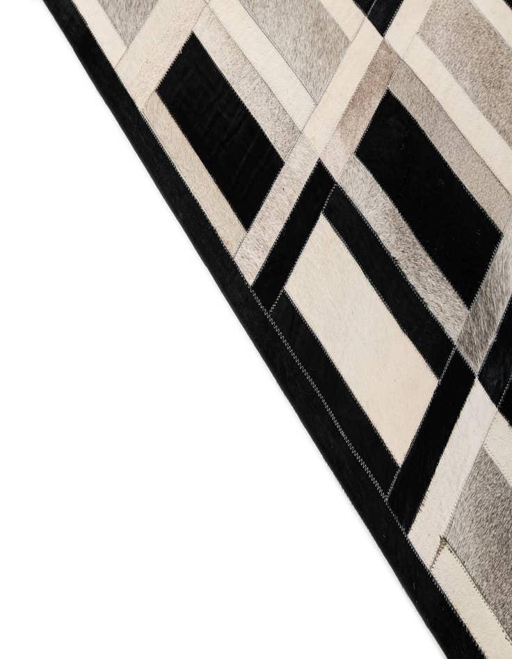 Detail image of  5' 1 x 7' 11 Cowhide - Patchwork Rug