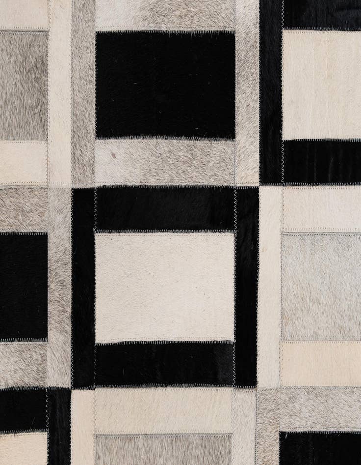 Detail image of  5' 1 x 7' 11 Cowhide - Patchwork Rug
