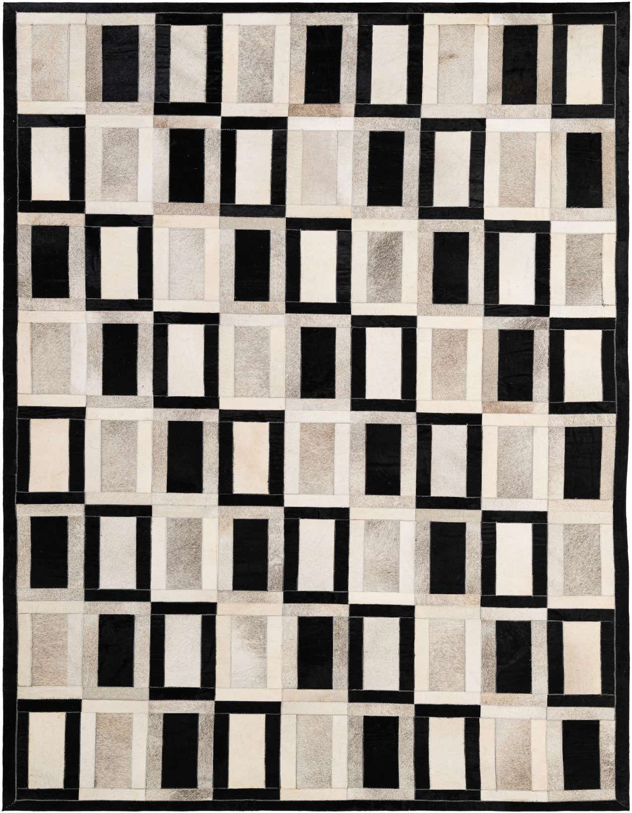 A 5x8 rectangular Cowhide rug featuring a modern patchwork design with black, white, and gray rectangular panels.