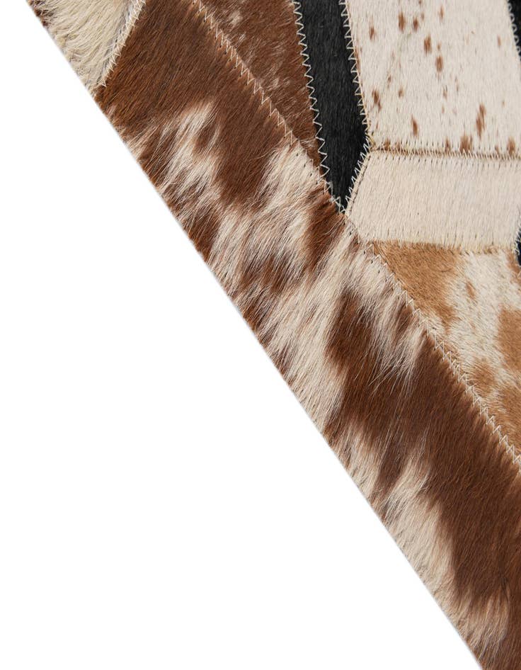 Detail image of  5' 1 x 8' 2 Cowhide - Patchwork Rug