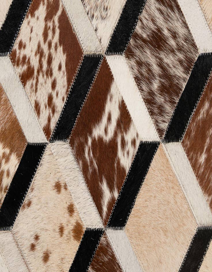 Detail image of  5' 1 x 8' 2 Cowhide - Patchwork Rug