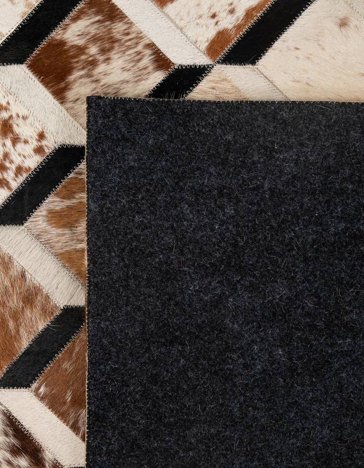 Detail image of  5' 1 x 8' 2 Cowhide - Patchwork Rug