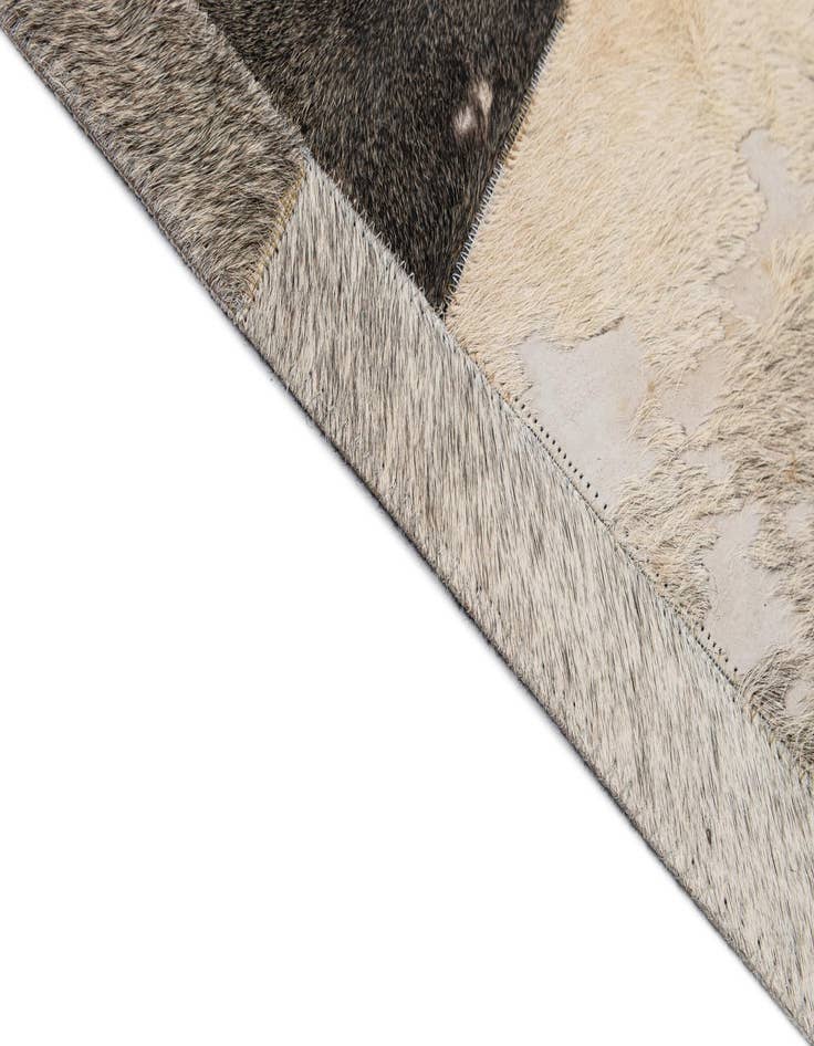 Detail image of  5' 2 x 8' Cowhide - Patchwork Rug