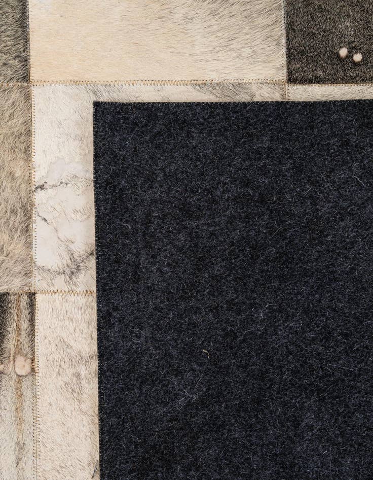 Detail image of  5' 2 x 8' Cowhide - Patchwork Rug