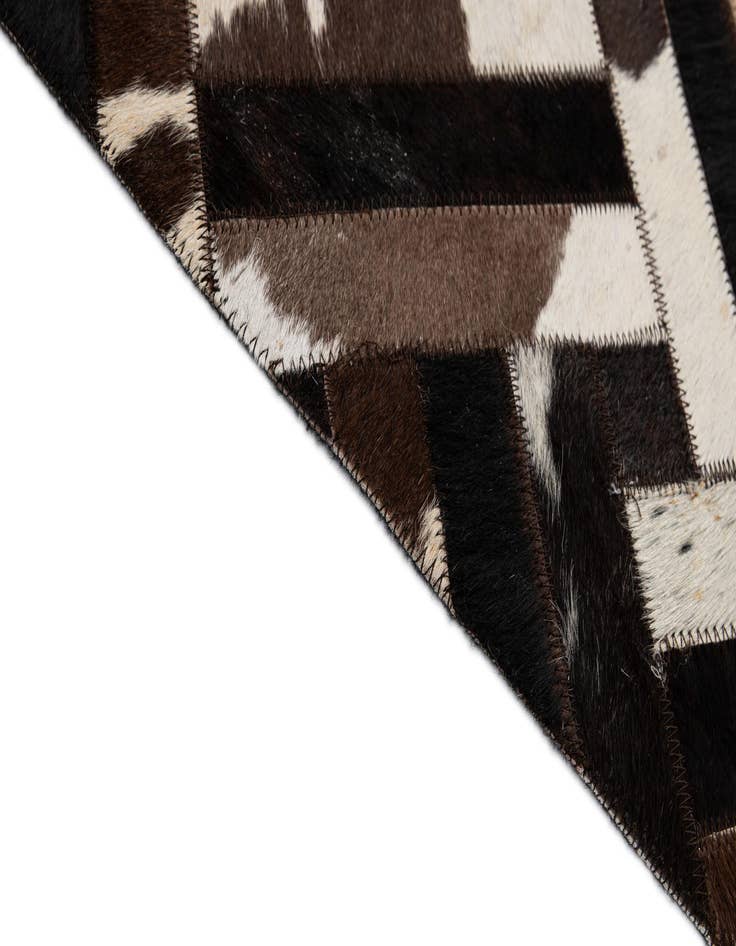 Detail image of  5' 1 x 8' Cowhide - Patchwork Rug
