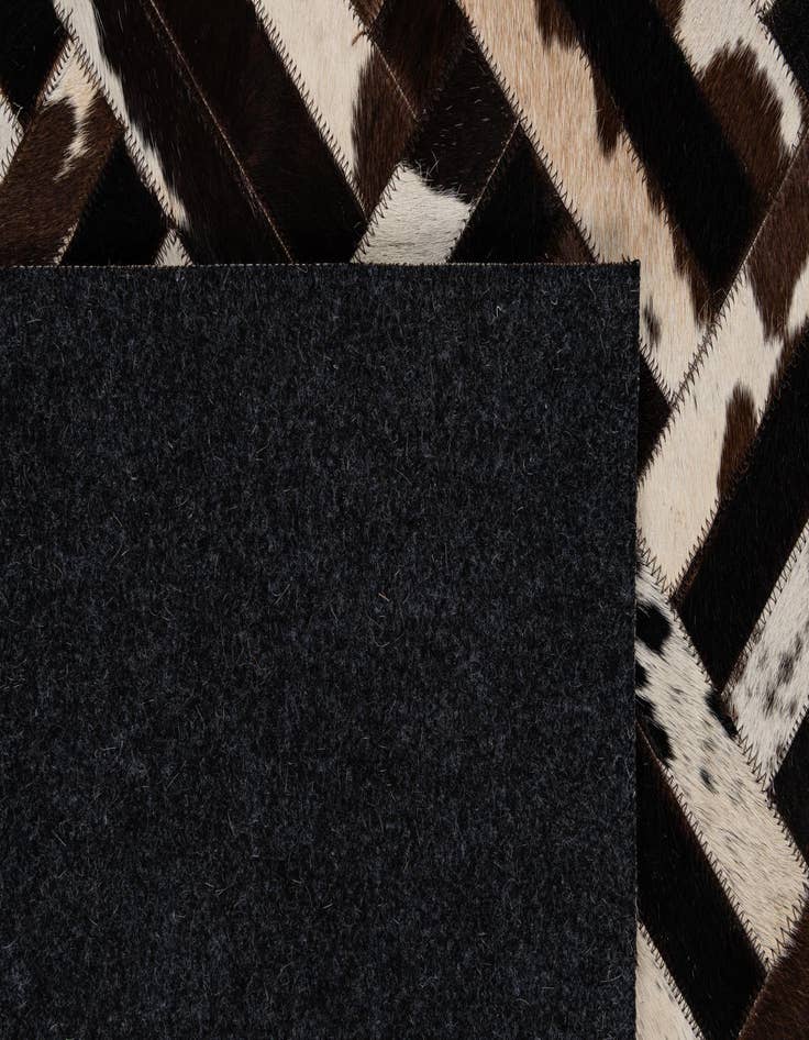 Detail image of  5' 1 x 8' Cowhide - Patchwork Rug