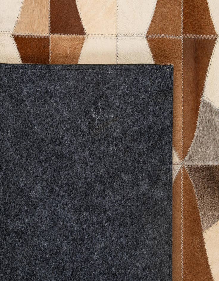 Detail image of  4' 11 x 7' 10 Cowhide - Patchwork Rug