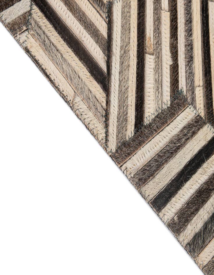 Detail image of  4' 11 x 8' 1 Cowhide - Patchwork Rug