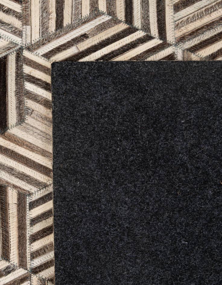 Detail image of  4' 11 x 8' 1 Cowhide - Patchwork Rug