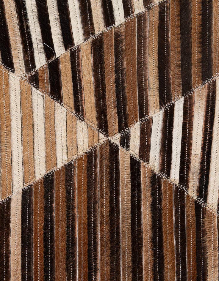 Detail image of  5' 1 x 8' 3 Cowhide - Patchwork Rug
