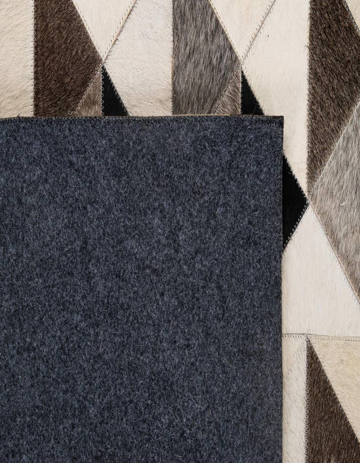 Detail image of  5' 3 x 8' 1 Cowhide - Patchwork Rug