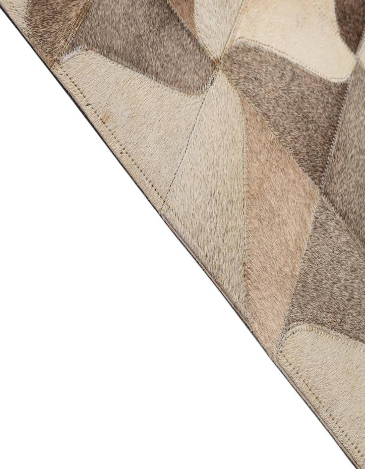 Detail image of  5' 2 x 7' 11 Cowhide - Patchwork Rug