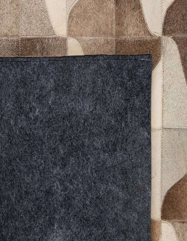 Detail image of  5' 2 x 7' 11 Cowhide - Patchwork Rug