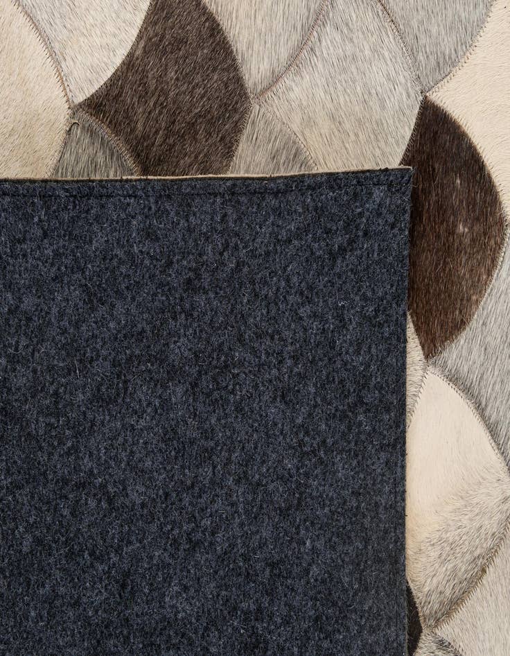 Detail image of  5' 1 x 8' Cowhide - Patchwork Rug