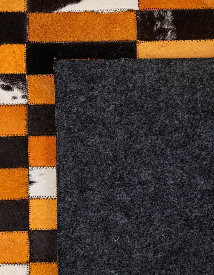 Detail image of  5' 2 x 7' 11 Cowhide - Patchwork Rug