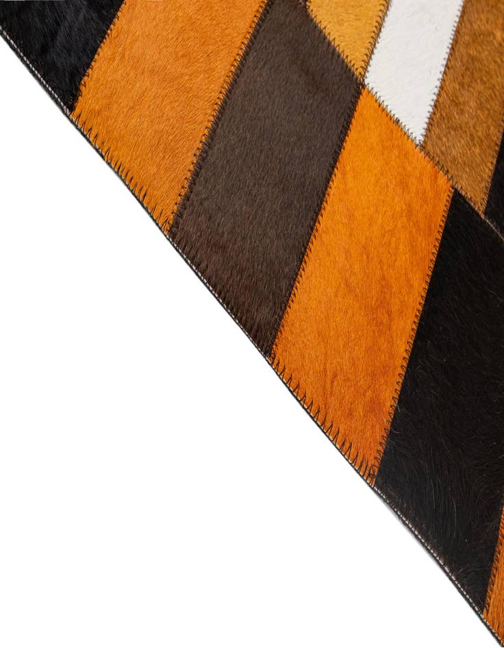 Detail image of  5' 1 x 7' 11 Cowhide - Patchwork Rug